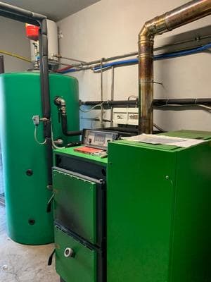 Realizzazione impianto ibrido con Pompa di calore e caldaia a legna